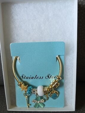 Gold Stainless Steel Charm Bracelet with Aqua and White Accents